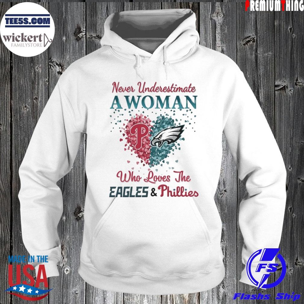 Never underestimate a woman who loves the heart eagles and phillies 2023 shirt Hoodie.jpg