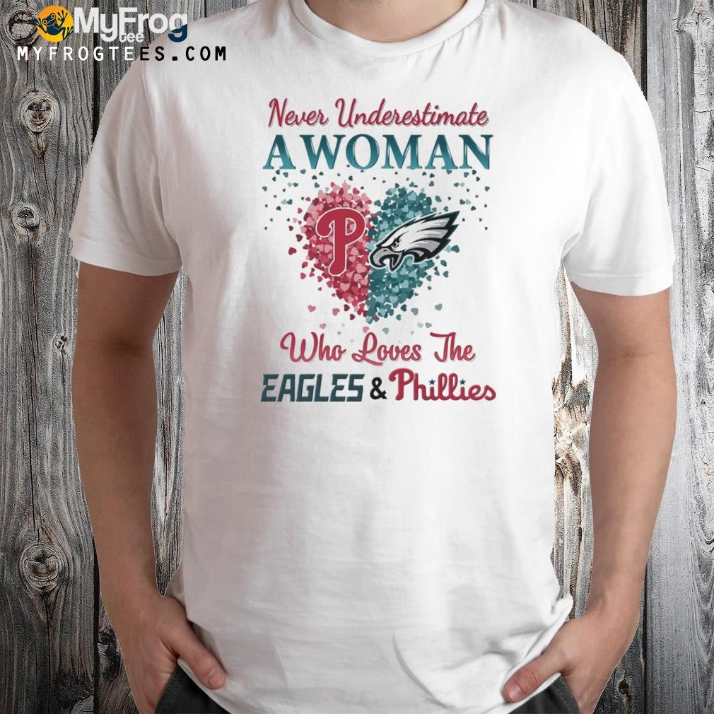 Never underestimate a woman who loves the heart eagles and phillies 2023 shirt